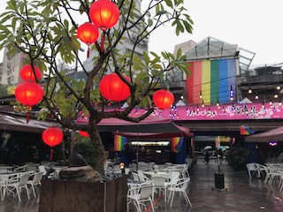 Shops around the Red House Theater and Rainbow Flag